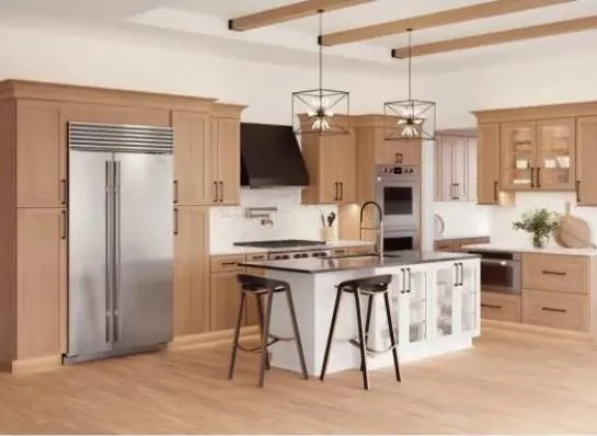Sandstone shaker kitchen with island, wood ceiling beams, and built-in refrigerator